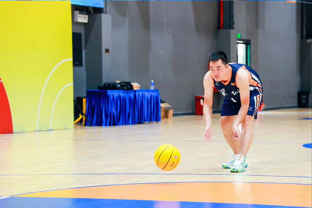 Rise basketball player is dribbling the ball