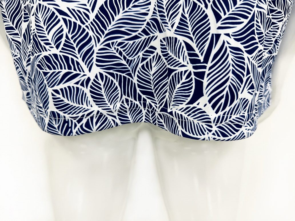 Hem design golf leaves blue polo shirt back view