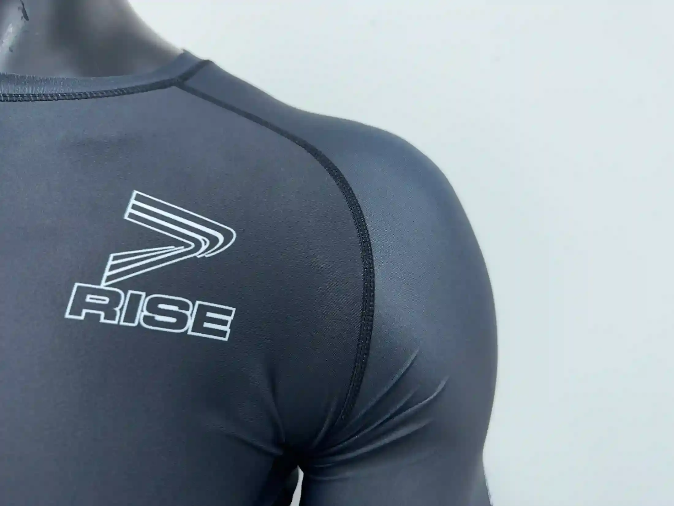 Detail of high density flatlock stitching at the raglan sleeve seam