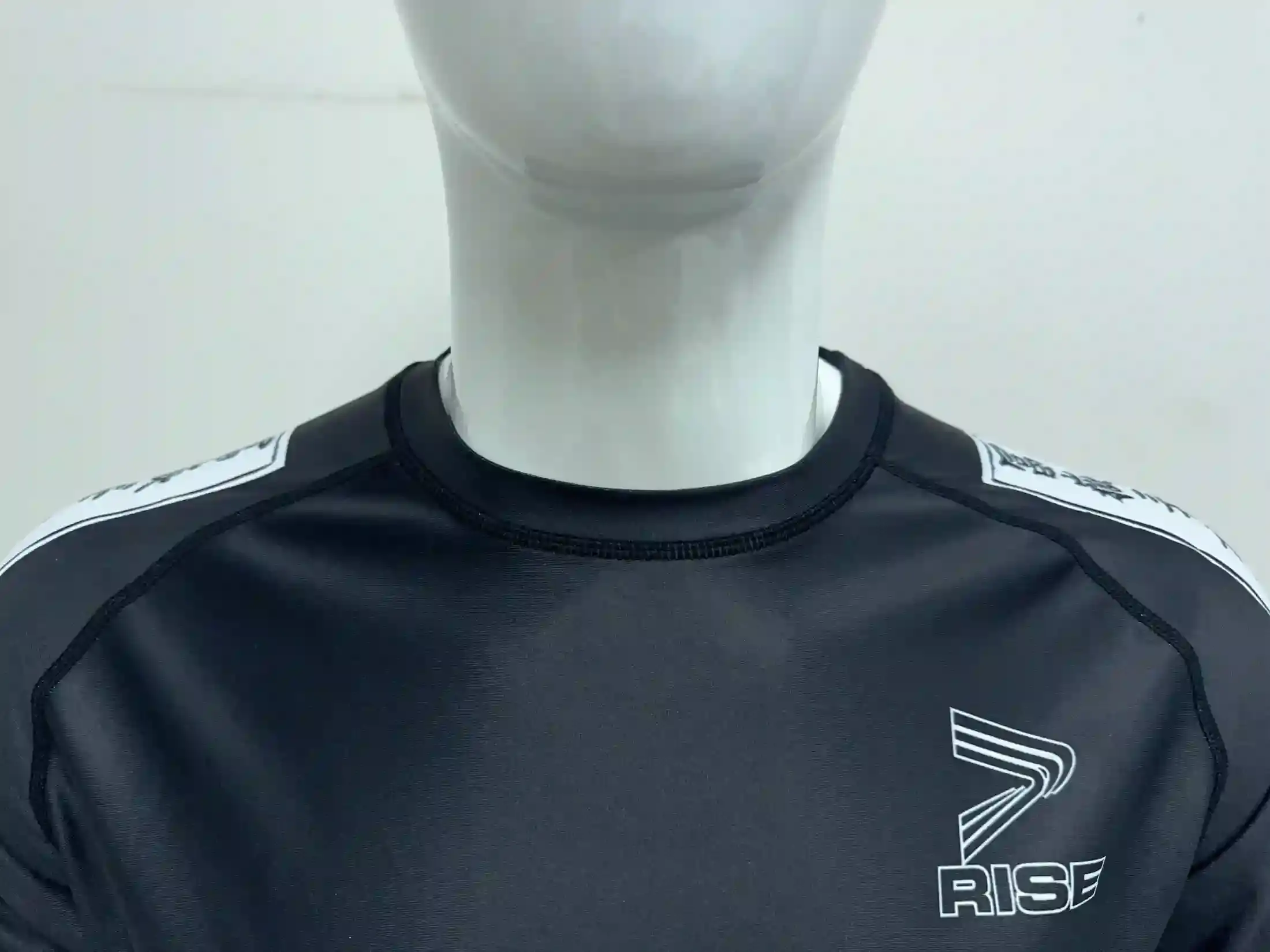 Detail of double overlock seams at the neckline