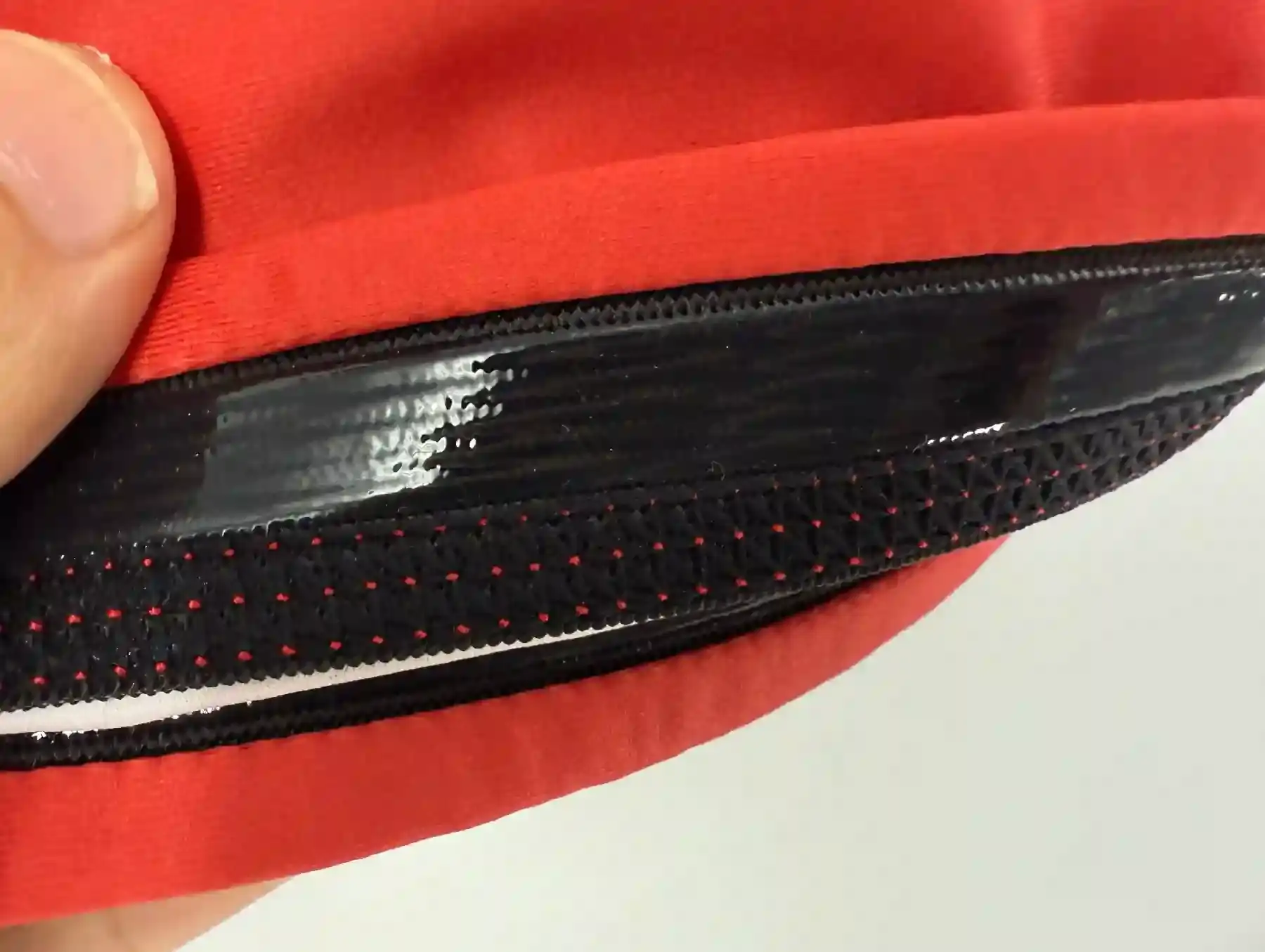 Detail of silicone anti-slip band inside the hem