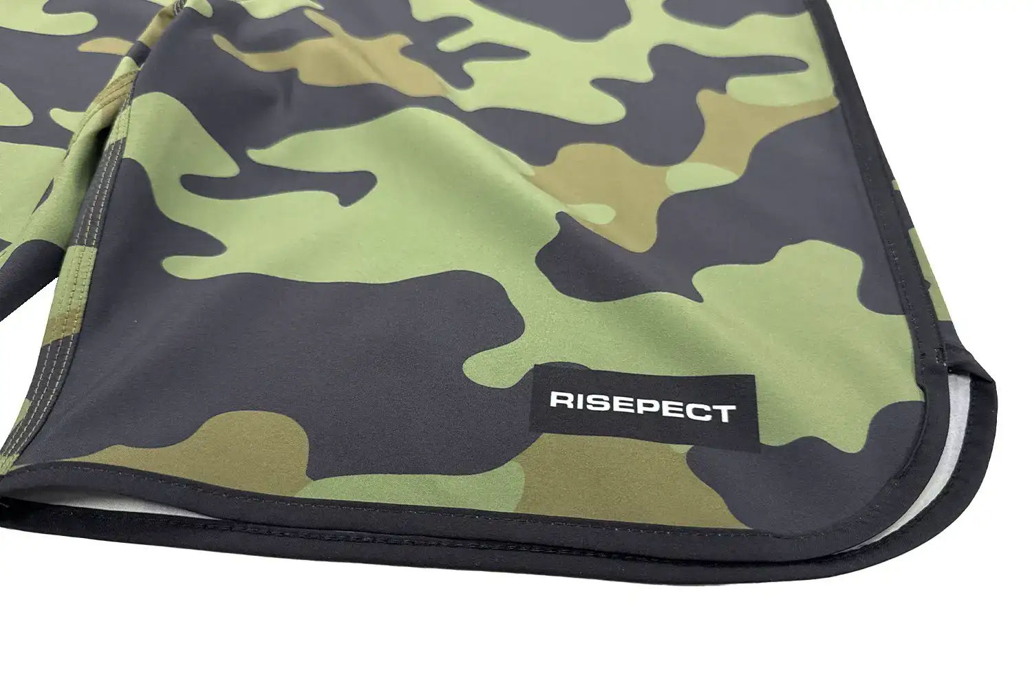 Detail of the Hem on the Green Camouflage Board Shorts