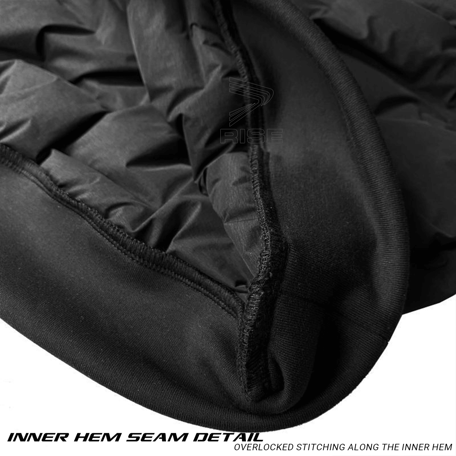 Inner Hem Seam Detail of Black Ultra Light Down Jacket Hoodless Inner Hem Seam Detail: Overlocked stitching along the inner hem ensures long-lasting structure and a refined finish.