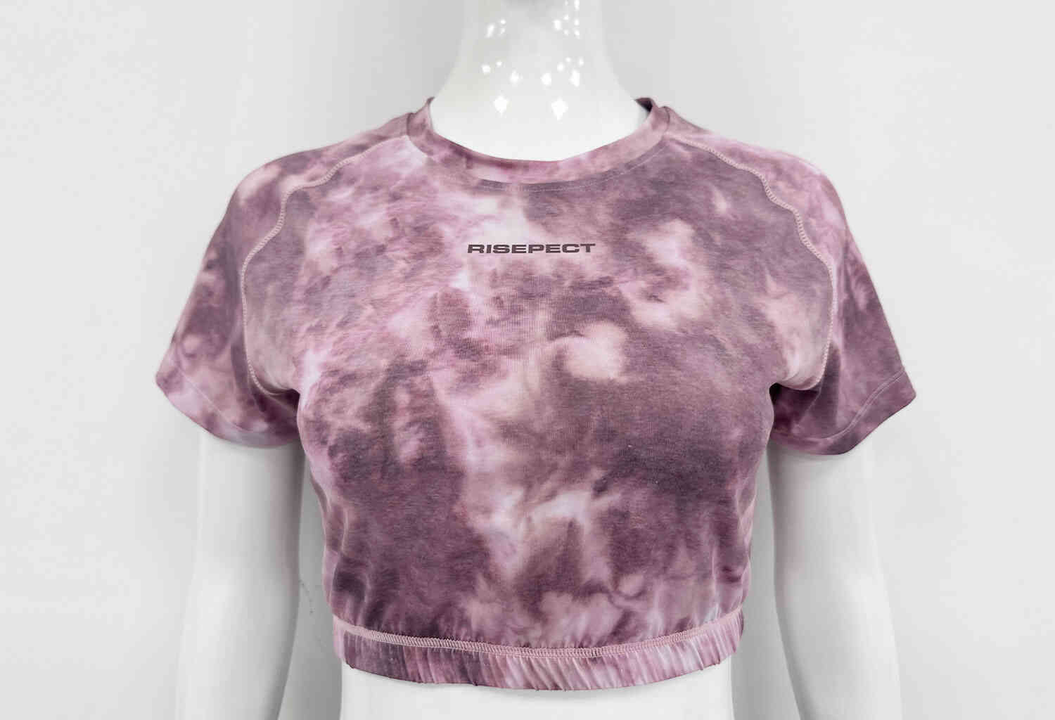 The front details of pink women's crop short sleeve top