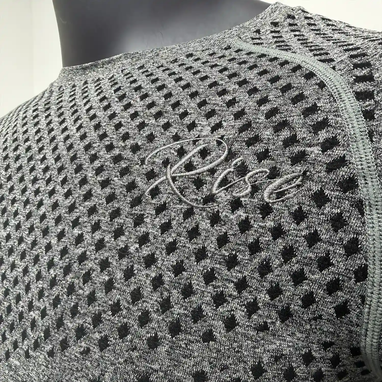 Detail 4 of Use men's sizes chart provided by Rise Sportswear, or custom your own brand, club, or team men's sizes chart for Ultrasonic Welded Seamless Knit Short Sleeve Rash Guard.