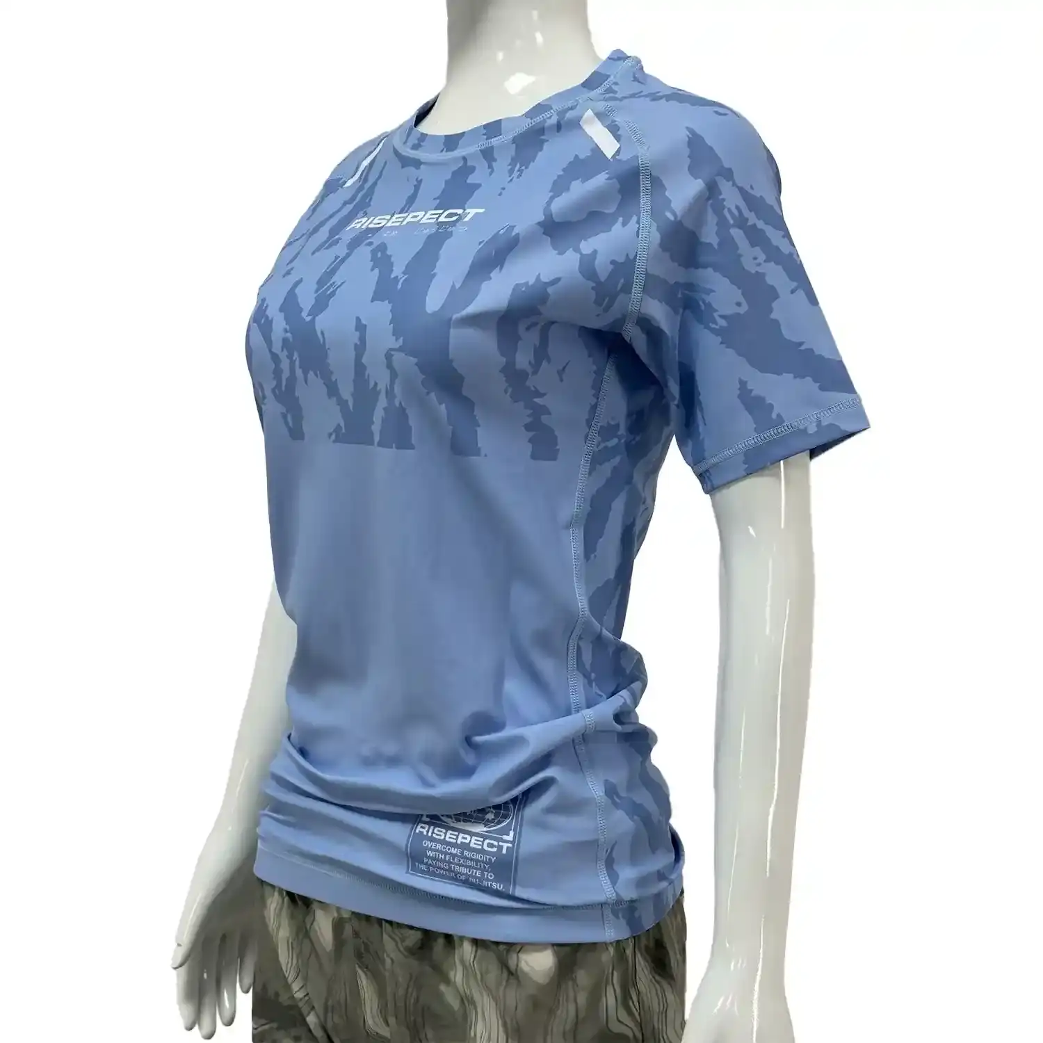 Women's light blue crack bjj rash guard long sleeve front side view