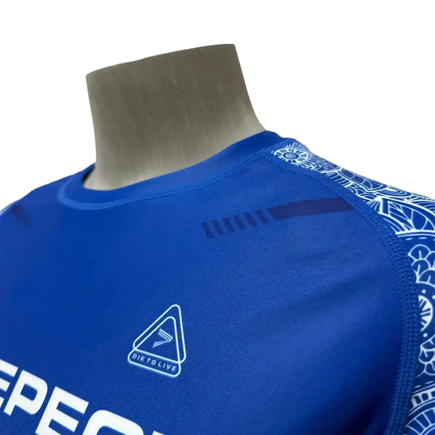Female power style royal blue bjj rash guard short sleeve flatlock seam details