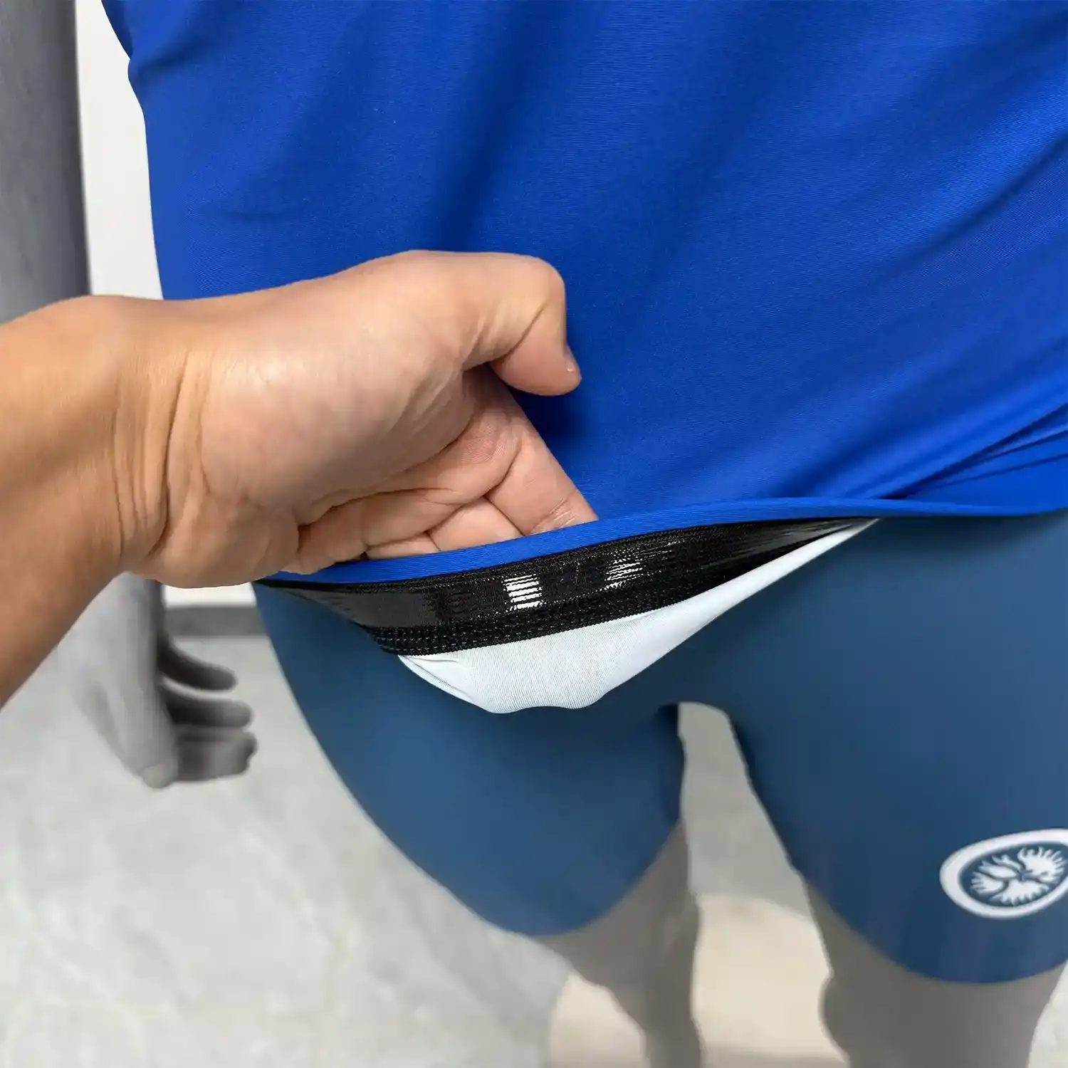 Female power style royal blue bjj rash guard short sleeve hem inside silicone strip details