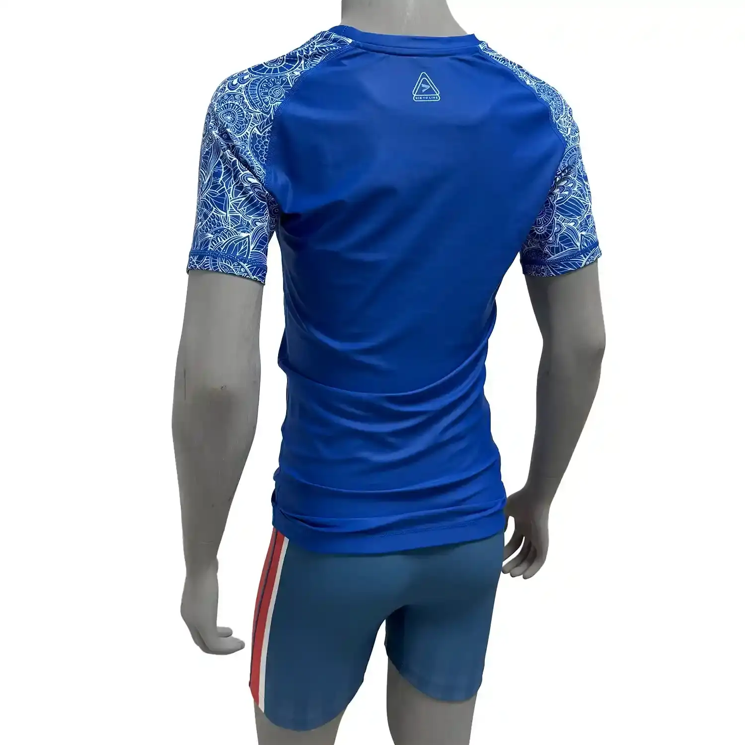 Female power style royal blue bjj rash guard short sleeve left back view