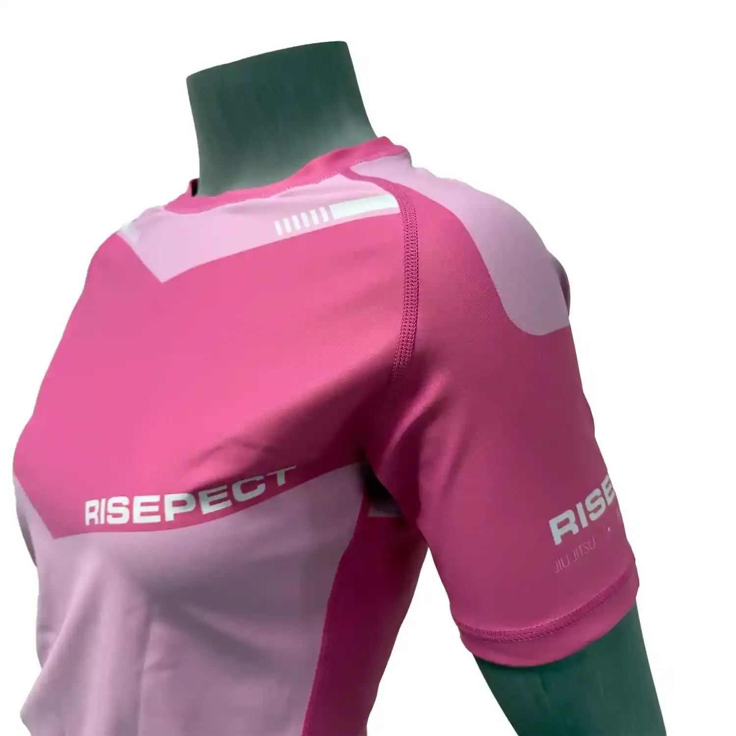 Women's feminine fit pink bjj rash guard short sleeve left front zoom flatlock seam details