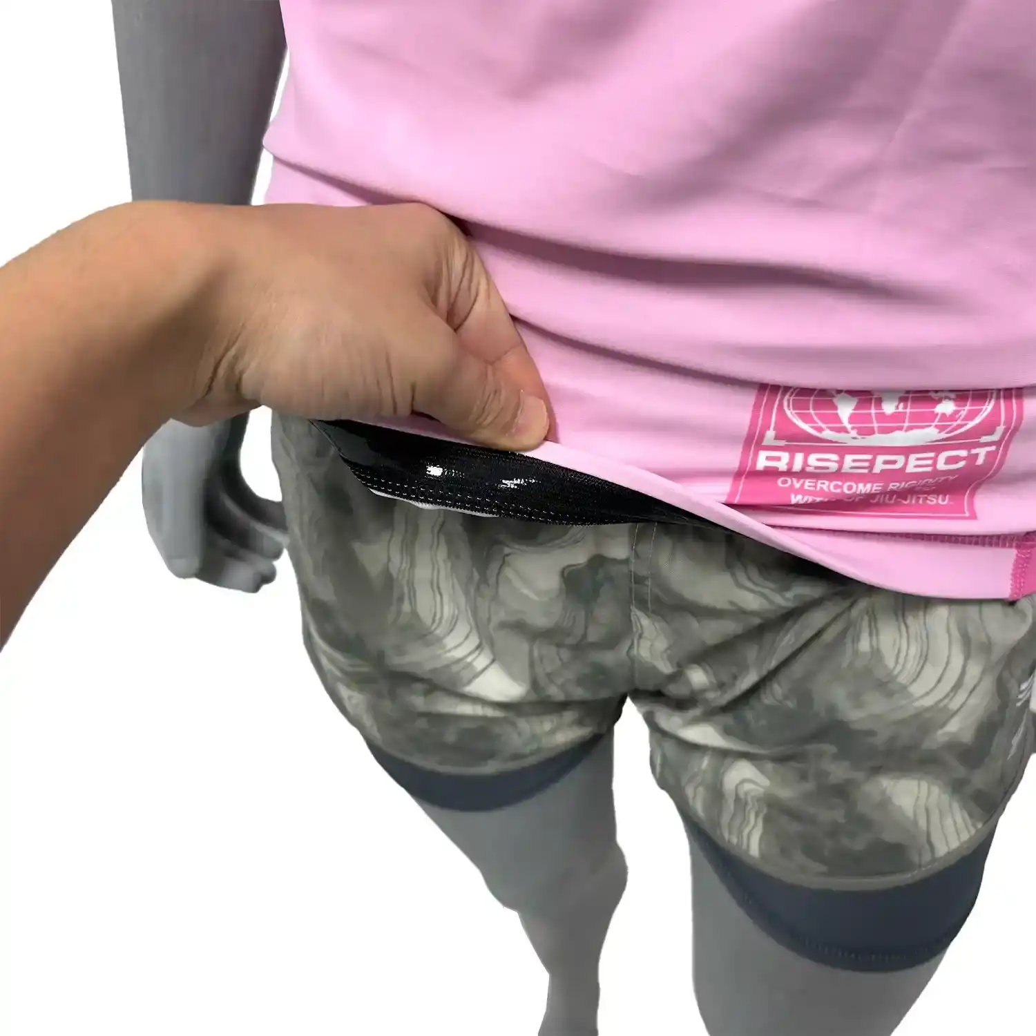 Women's feminine fit pink bjj rash guard short sleeve hem inside silicone strip details