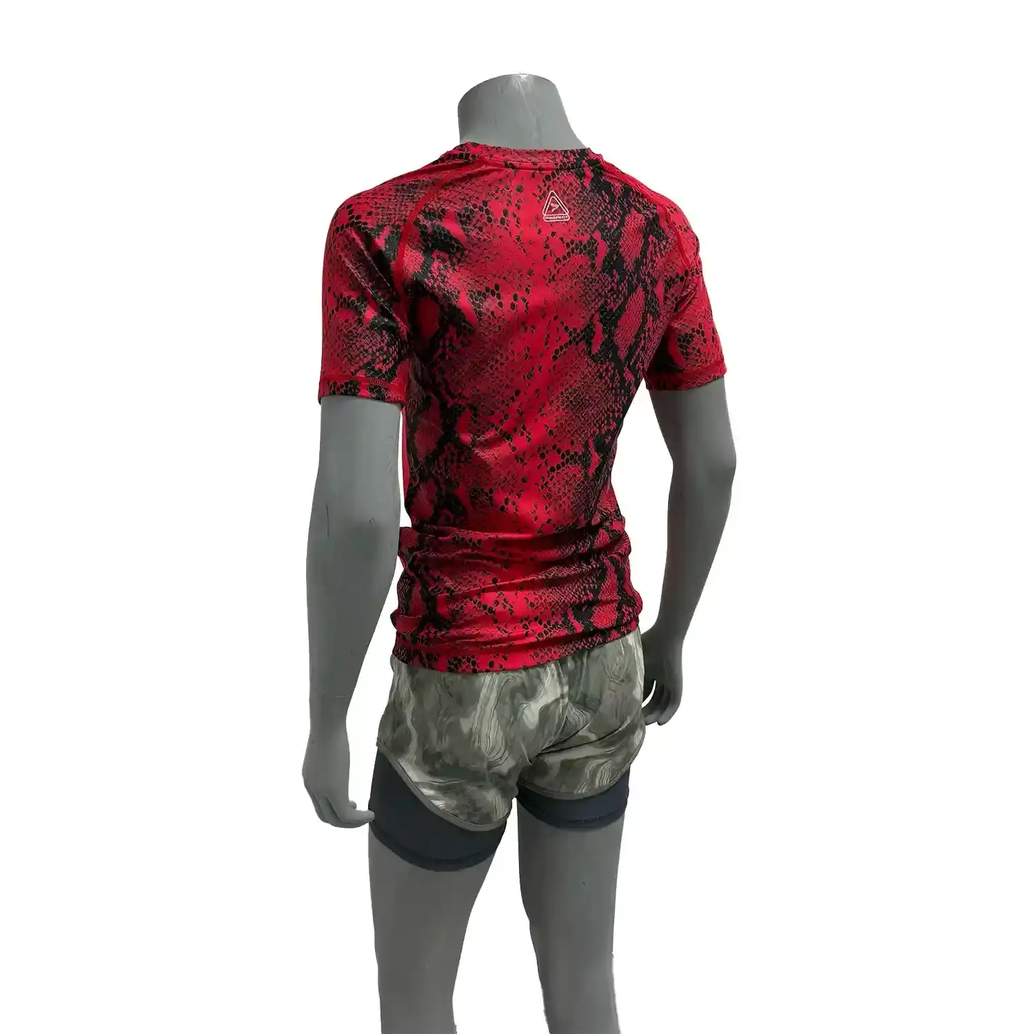 Female model in red snake pattern bjj rash guard short sleeve left back view