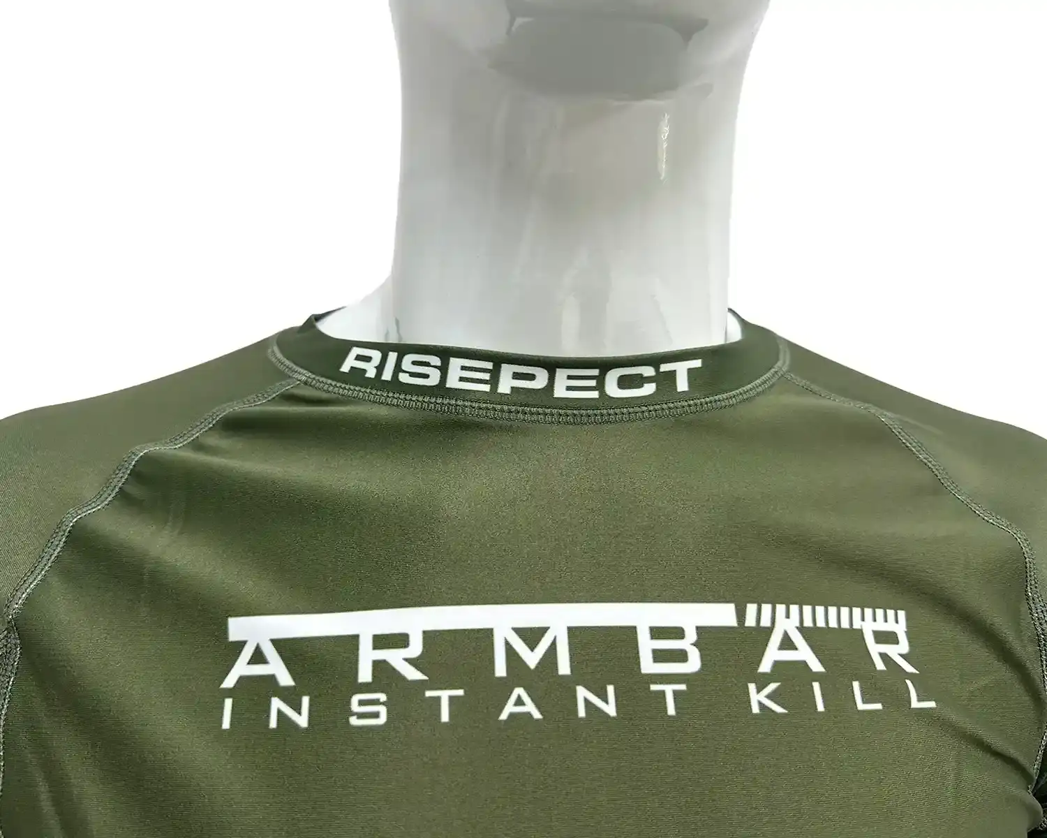 Dark green rash guard jiu-jitsu short sleeve neck details