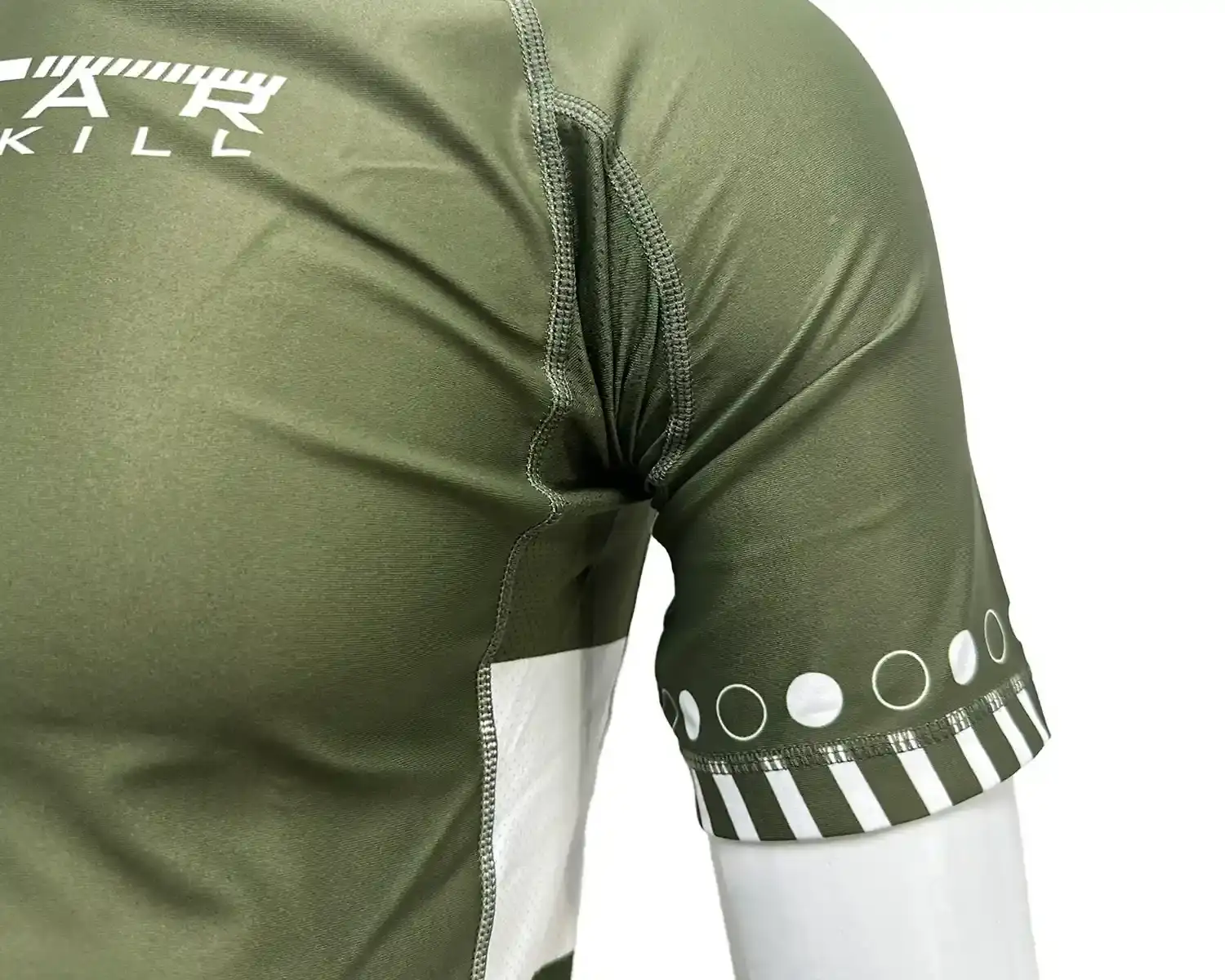Dark green rash guard jiu-jitsu short sleeve underarm mesh and flatlock seam details