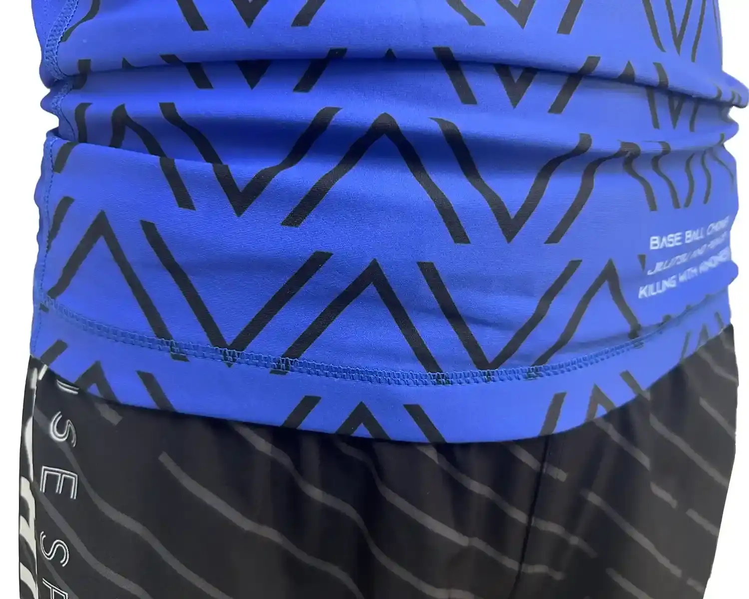 Blue rash guards with black wave hem outside details
