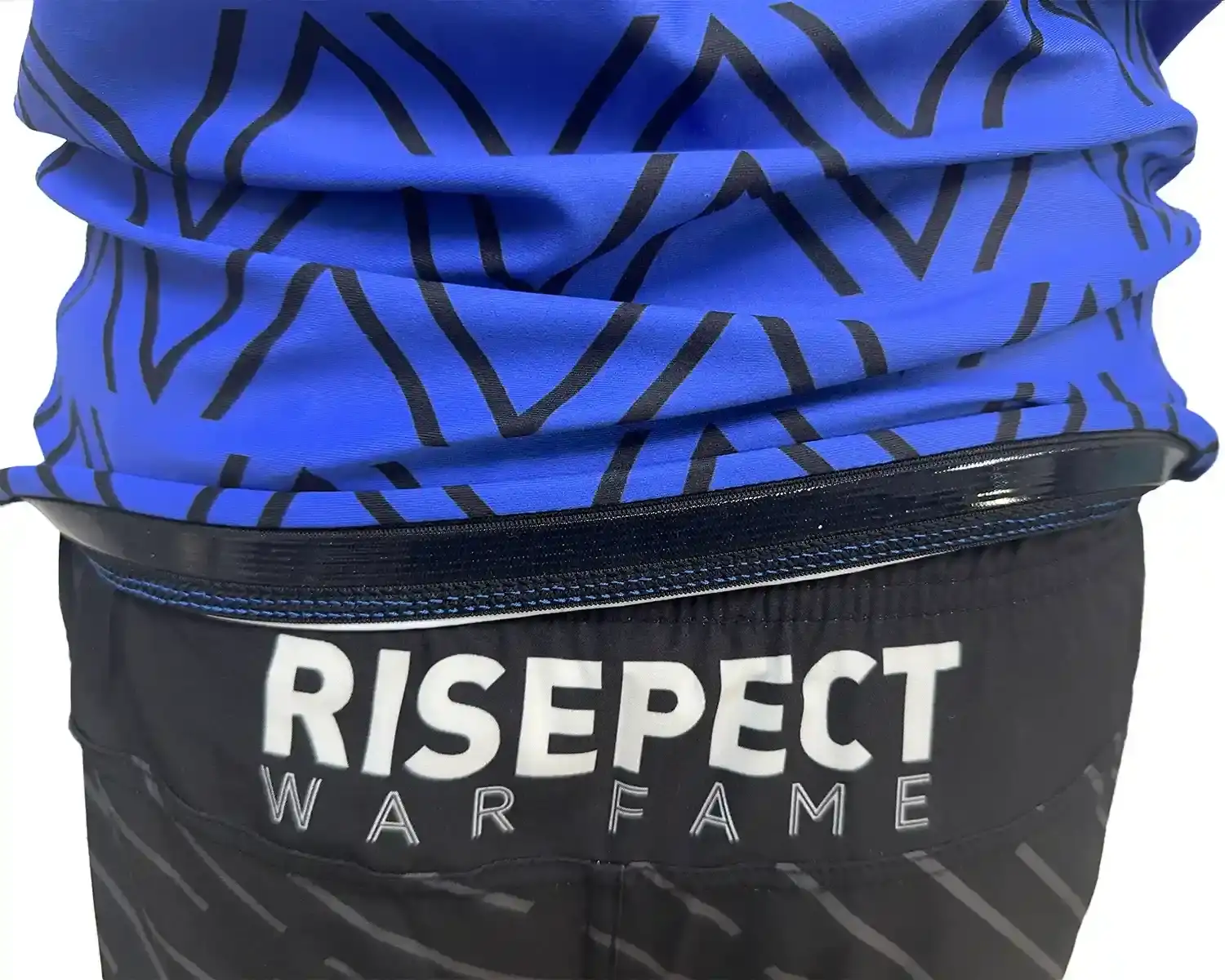 Blue rash guards with black wave hem inside silicone strip details