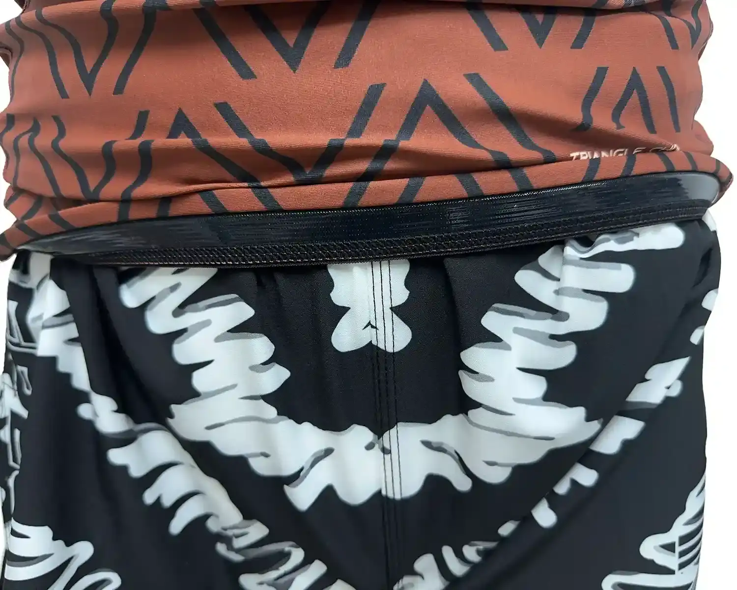 Brown rash guard black waves for men bjj hem inside silicone strip details