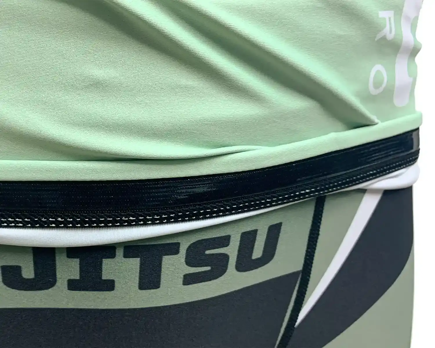 Rose bjj rash guard green hem inside silicone strip details