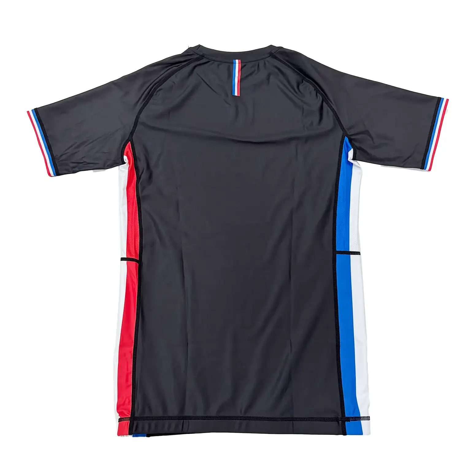 The flat lay back of Custom black short sleeve rash guard France jiujitsu