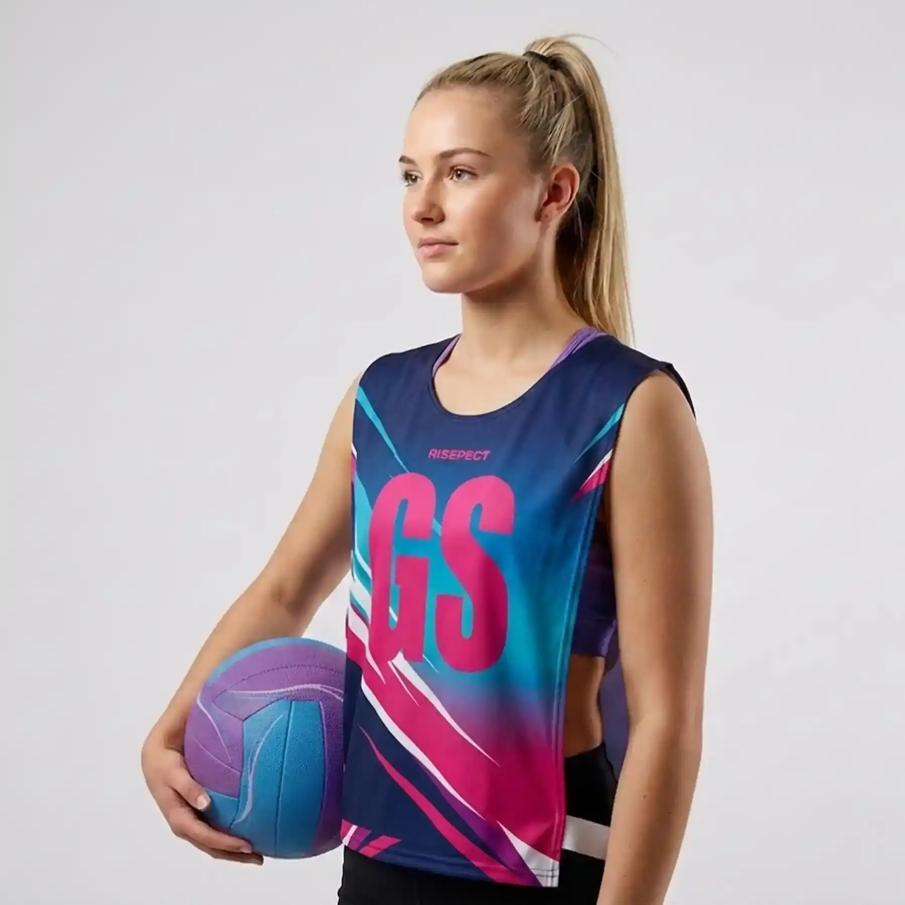 Female Model in Navy-Pink Rowing Practice Pinnie with Elastic Straps