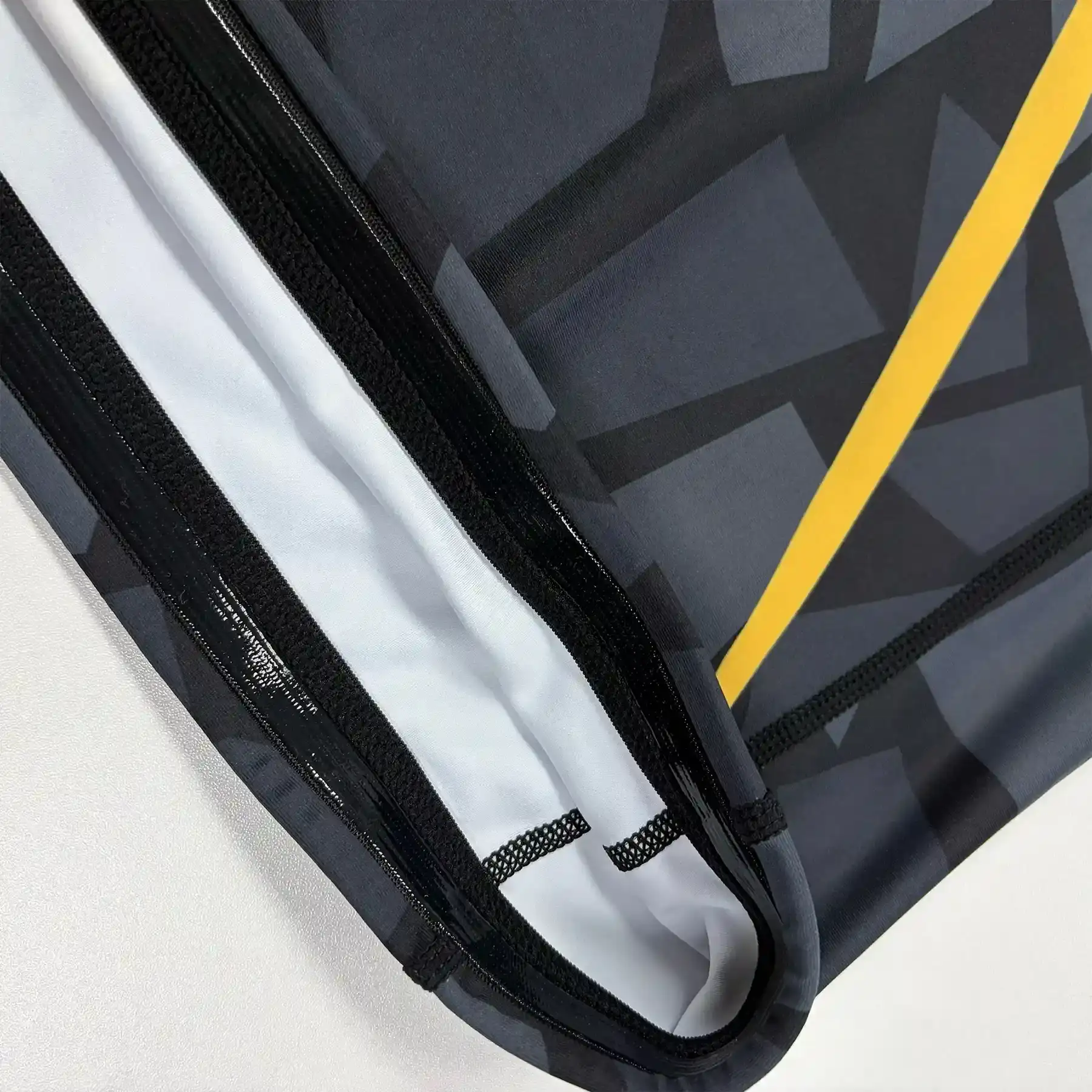 The anti-slip silicone strip details of Alliance nogi rash guard